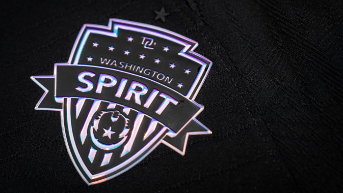 Chrome, reflective Washington Spirit logo